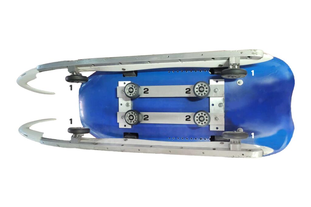 Luge sled equipped with wheels for use with the Rodby Luge Treadmill